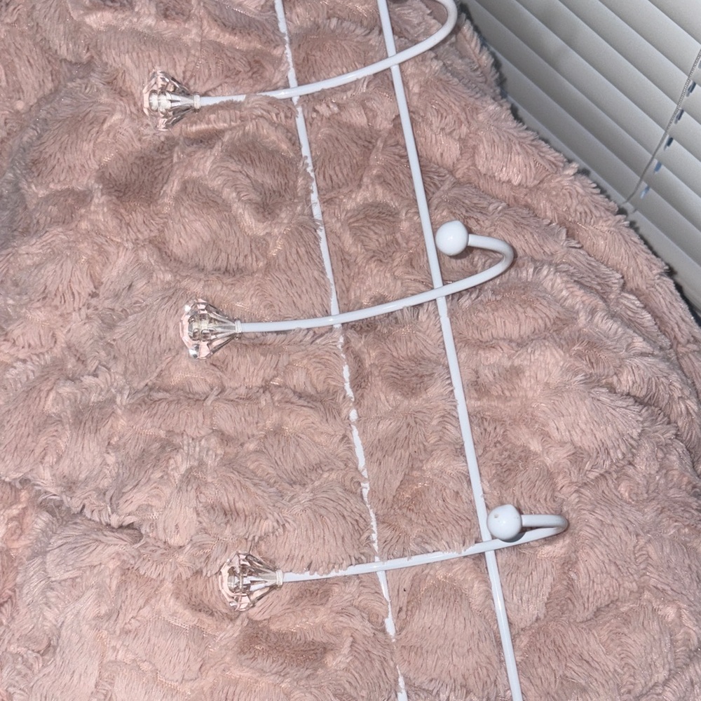 White jacket holder with gems